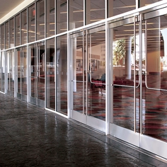 All-Glass Entrances Featuring DRS Wedge-Lock Door Rail System
