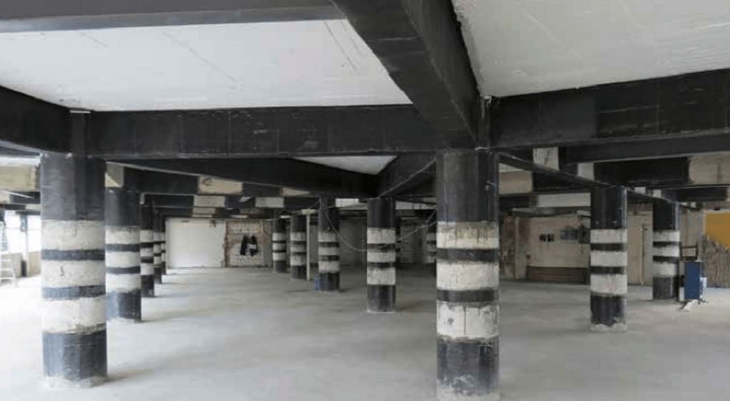 Structural strengthening with CFRP plates and FRP fabrics