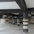 Structural strengthening with CFRP plates and FRP fabrics