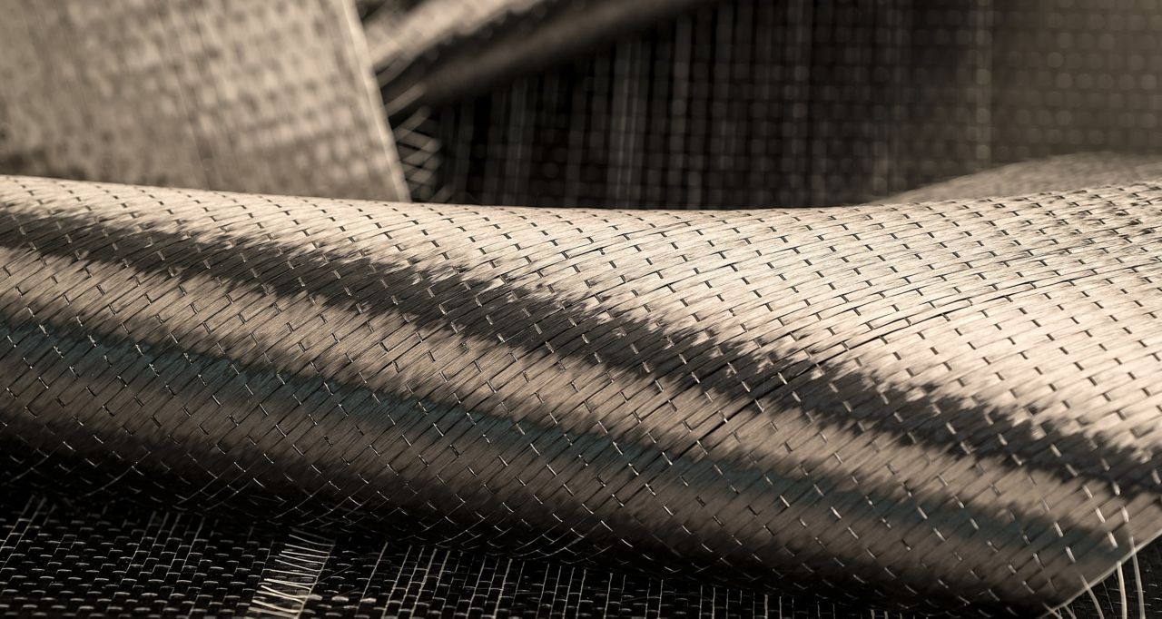 Structural strengthening with CFRP plates and FRP fabrics