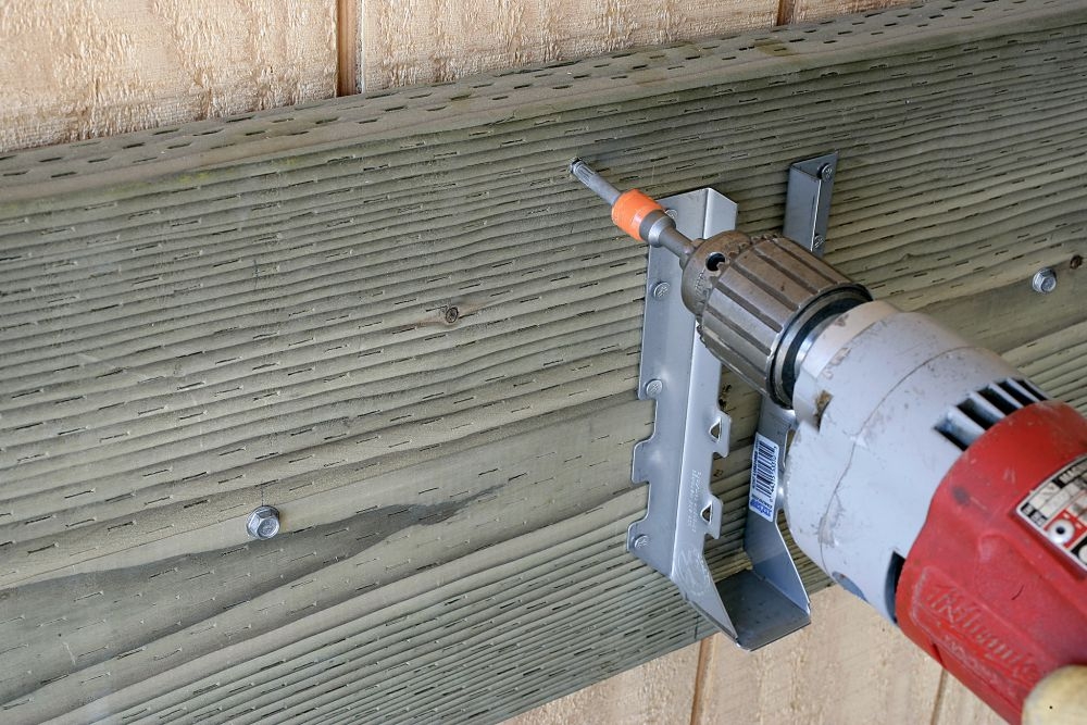 Fijaciones para estructuras de madera y metal