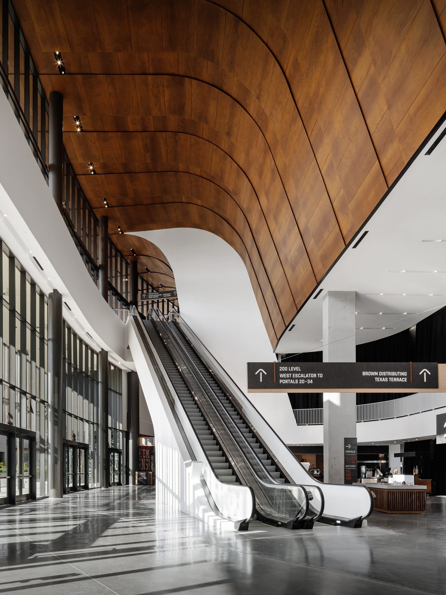 Curved Wooden Soffit in the UT Moody Center Arena