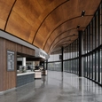 Curved Wooden Soffit in the UT Moody Center Arena