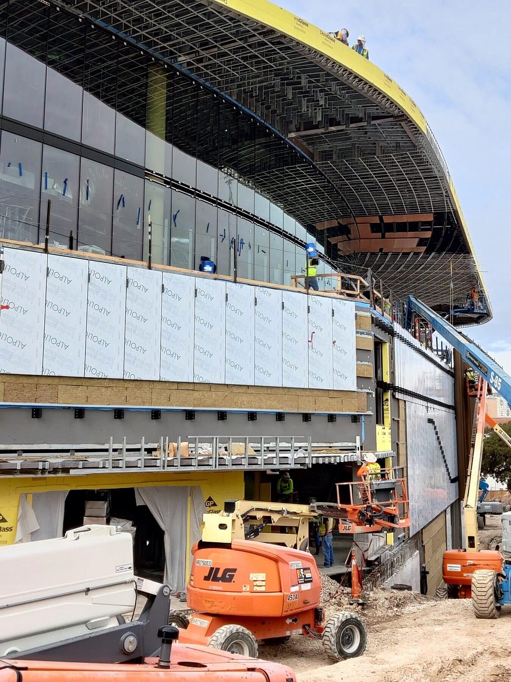 Curved Wooden Soffit in the UT Moody Center Arena