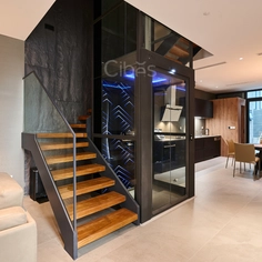 Glass Cabin Lift In Modern Style Home