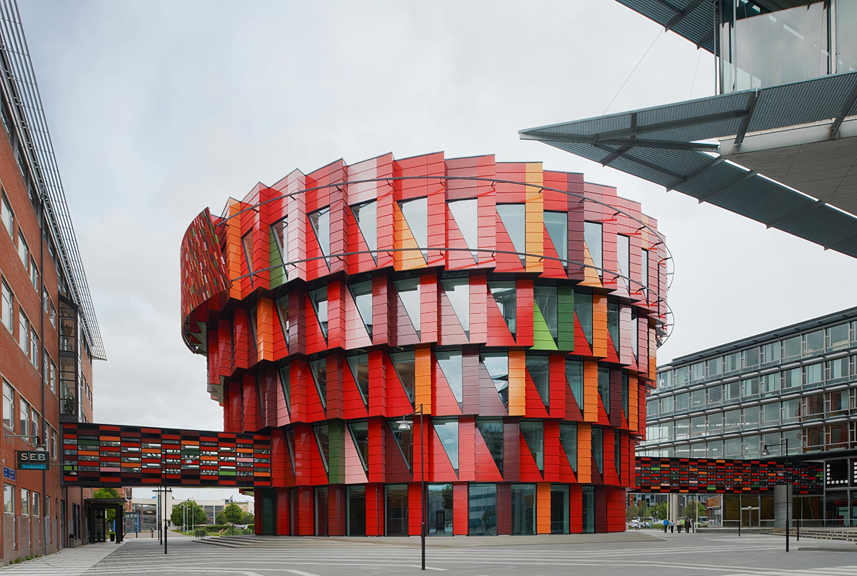 Triangular Terracotta tiles on Facade of the New Kuggen Building | LONGOTON