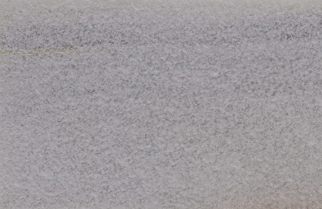 Sand blasted and brushed Silver Cloud marble