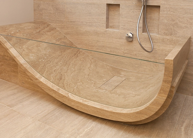 Custom bathtub in solid Travertino