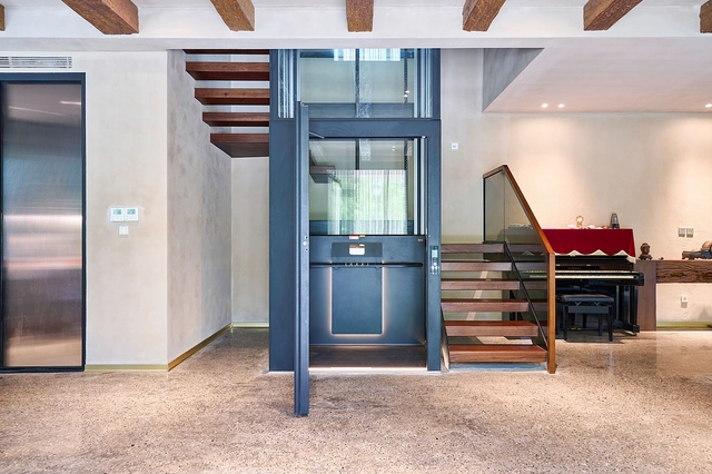 Glass Platform Lift at a Nordic-Style Residence