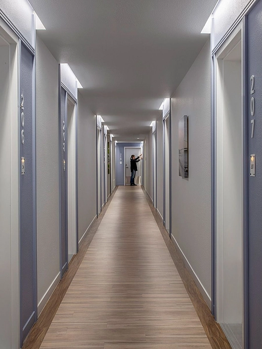 Slim LED Cove Lighting in housing project corridors