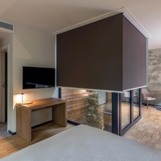 Cortinas One-Box en cabañas verdes de Padua