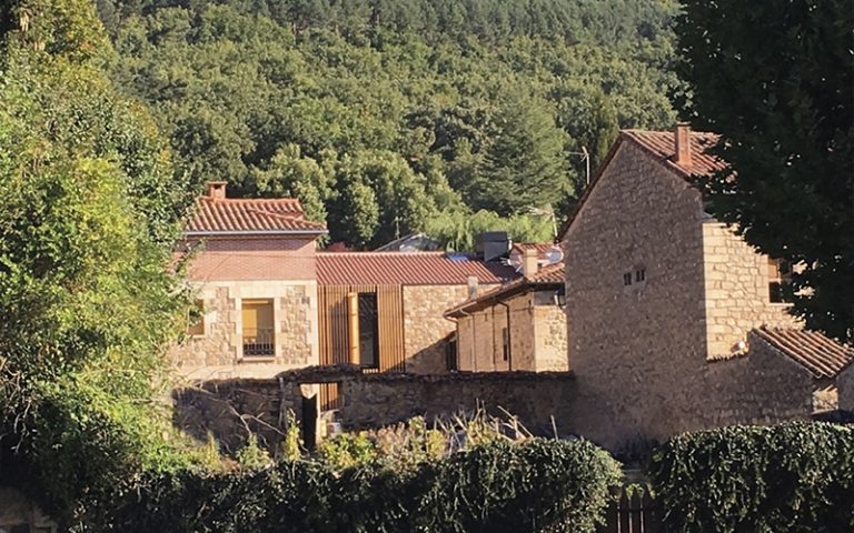 Rustic Tile Roof in Modern Salduero Home
