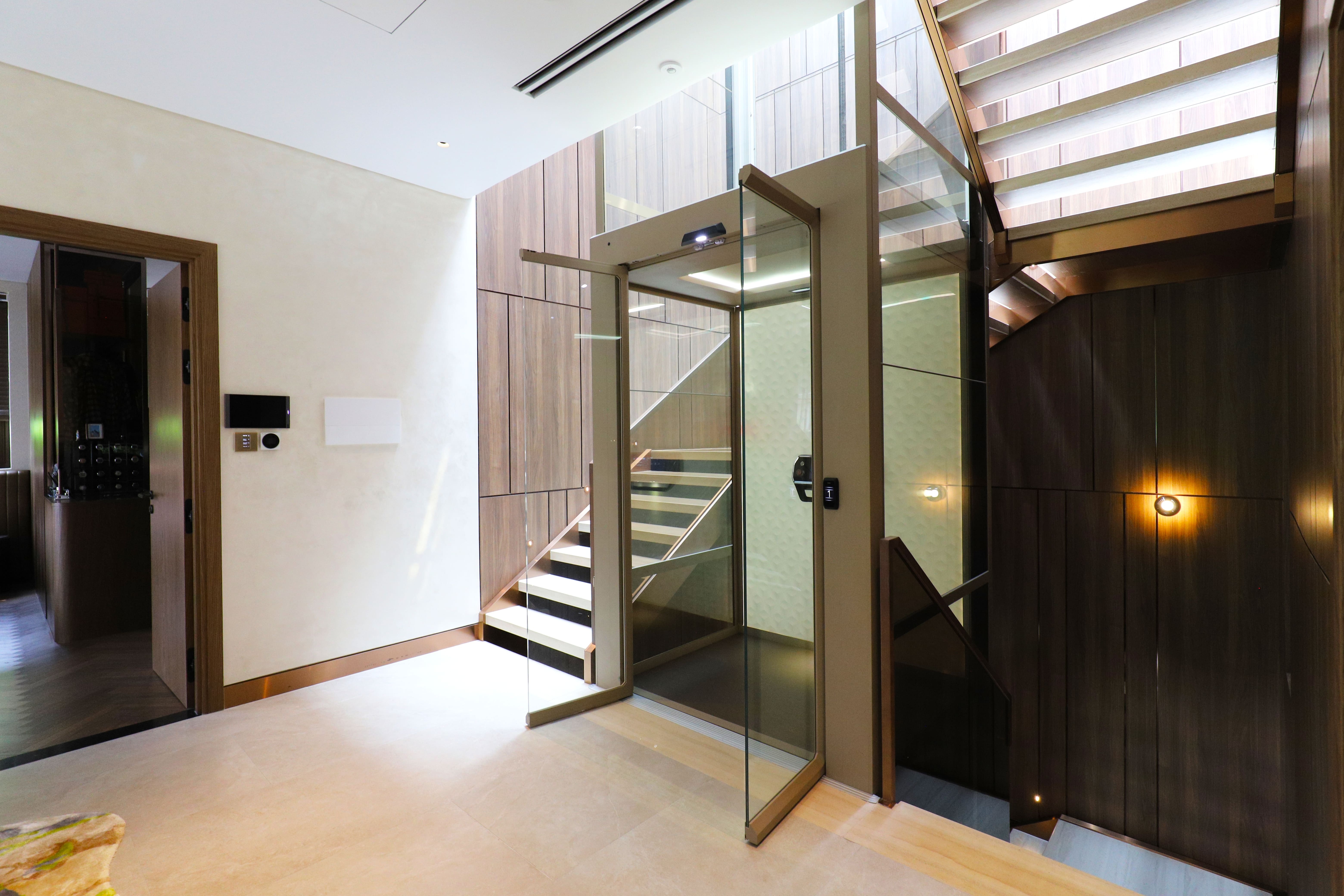 Scandinavian Glass Elevator in a Saigon Villa