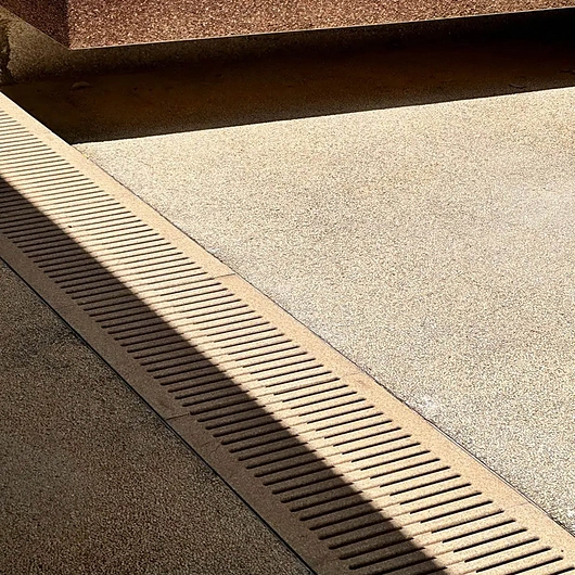 Reinforced trench grates and sump covers