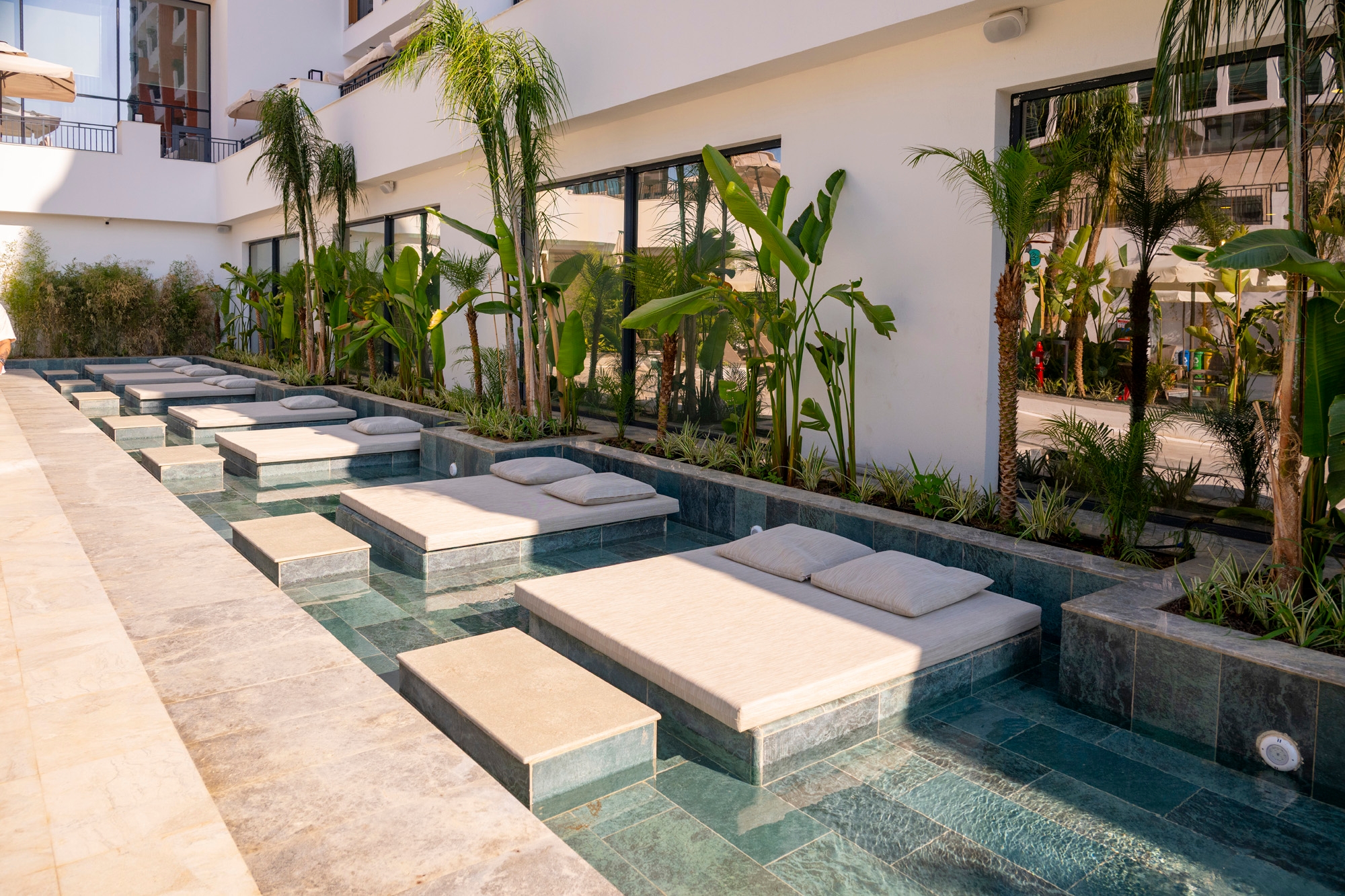 Natural-Toned Tiles in Hotel Pool