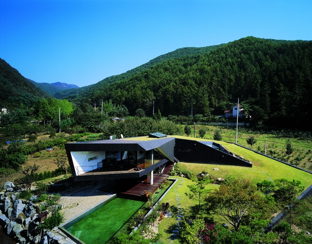 Villa Topoject / AND - Houses, Garden, Forest