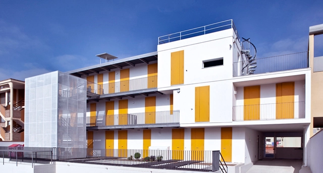 Social Housing in Elmas / 2+1 officina architettura - Social Housing, Facade, Stairs, Handrail, Balcony