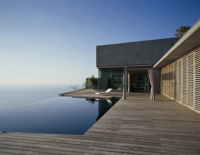 Casa en Jardín del Sol / Corona y P. Amaral Arquitectos - Casas