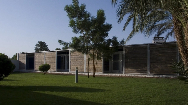 Complejo habitacional para médicos, Centro Salam de Cirugía Cardiaca / Studio TAM associati - Vivienda Colectiva, Jardín, Fachada, Puerta