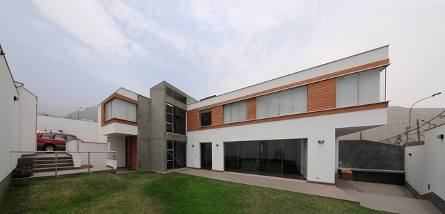 Casa en L / Procesos Urbanos - Casas, Fachada