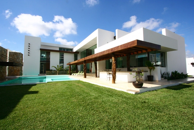 Casa Los Troncos / Punto Arquitectónico - Casas, Patio interior, Fachada, Puerta