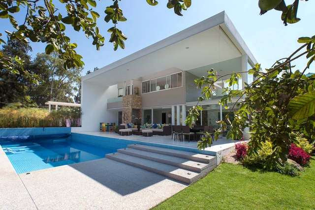 Casa del Viento /  A-001 Taller de Arquitectura - Jardín, Fachada, Puerta, Sillas