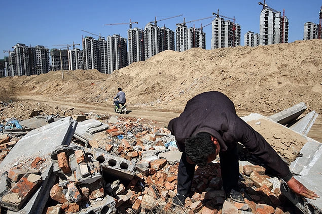 China desaloja camponeses para promover urbanização - Imagem de Destaque