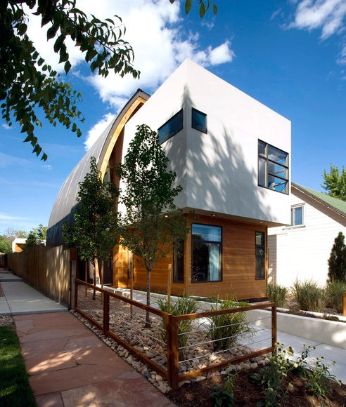 Casa Escudo / Studio H:T - Casas
