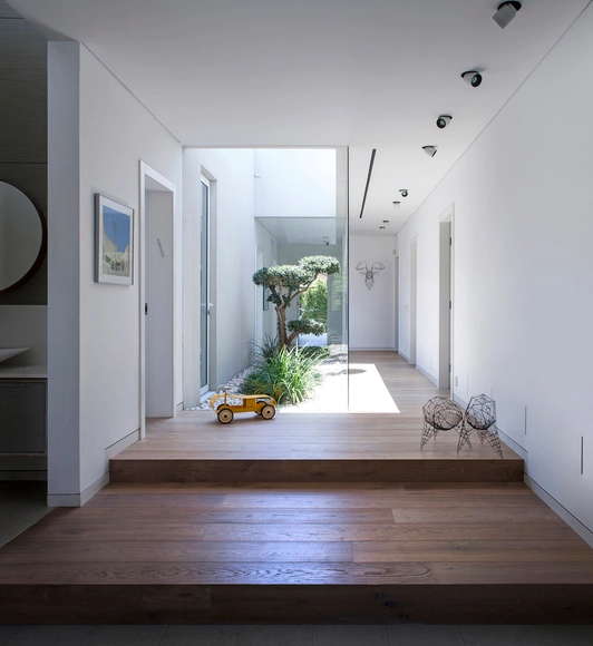 La familia como una comunidad / Jacobs-Yaniv Architects - Casas