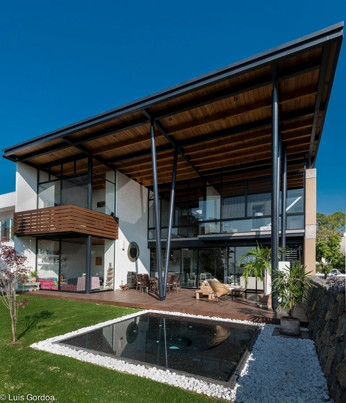 Casa Ajusco / Arquitectura Alternativa - Casas, Patio interior, Fachada, Fijación Vigas