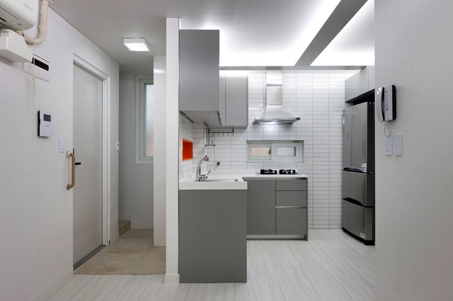 Suo-jae: The House to Uphold Myself / Studio GAON - Refurbishment, Kitchen, Door, Facade, Countertop, Lighting, Sink, Chair, Table