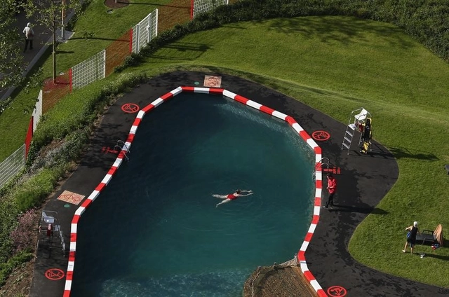 Ooze Architects Unveil A Natural Bathing Pond In London's King's Cross - Featured Image