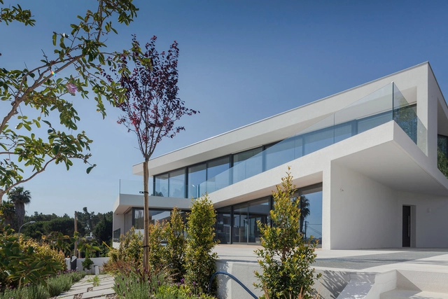 Casa JC / JPS Atelier - Casas
