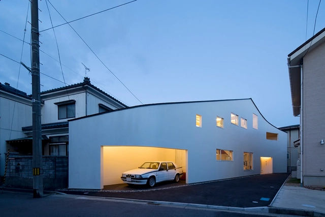 Casa al lado del camino / naf Architect & Design - Casas