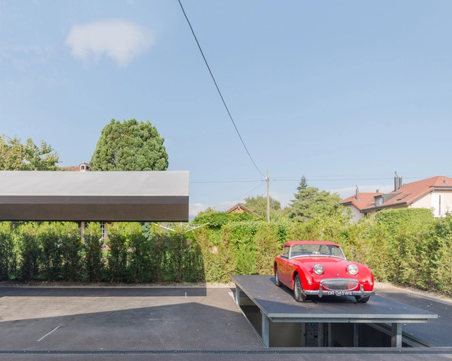 Garaje y exhibición de automóviles subterráneo / b29 architectes - Obras De Pequeña Escala