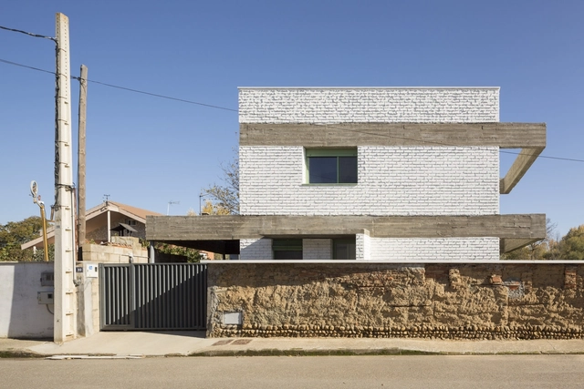 Casa en un huerto / Javier Ramos Morán + Moisés Puente Rodríguez - Casas