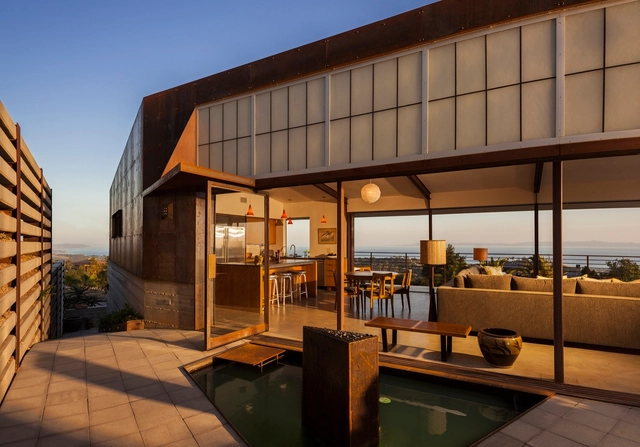 Casa muro cruzado / Mobile Office Architects - Casas