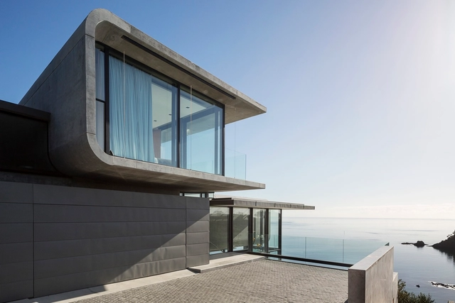 Residencia Bahía Hekerua / Archimedia - Casas