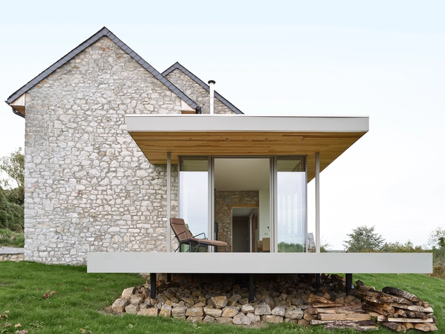Renovación y extensión de una casa de vacaciones / Dehullu Architecten - Renovación