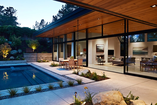 Casa muro de cristal / Klopf Architecture - Casas