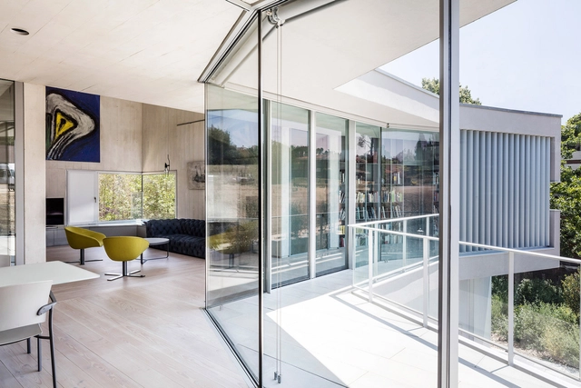 Casa con espacio para la exposición de arte contemporáneo / 05AM Arquitectura - Casas