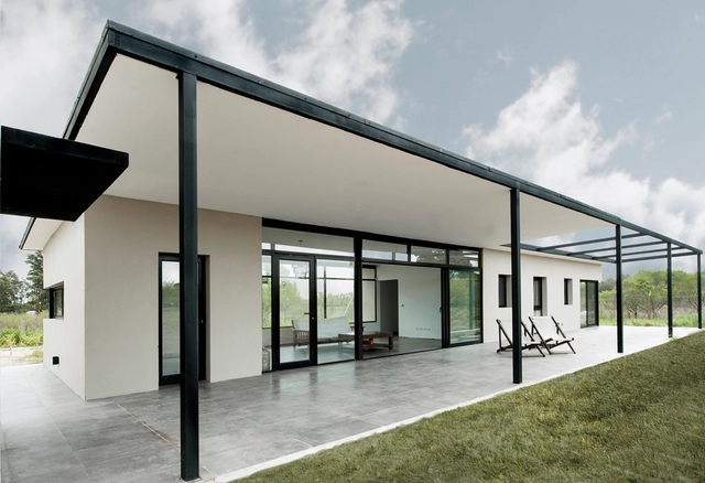 Casa Fede  / Unoencinco Arquitectura - Casas