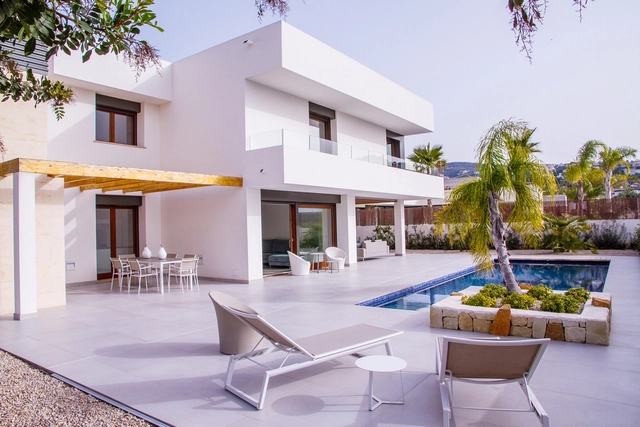  Passive House Villa Moraira  / Dicam Passive House    &   Amalur Arquitectos - Casas, Patio, Fachada, Puerta, Sillas, Mesas
