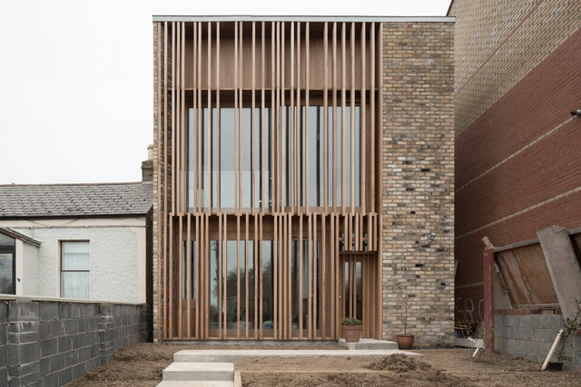 Um acima, dois abaixo  / Mccullough Mulvin Architects - Casas