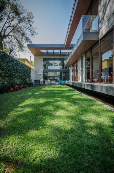 La Casa Palmas / Revolution - Casas