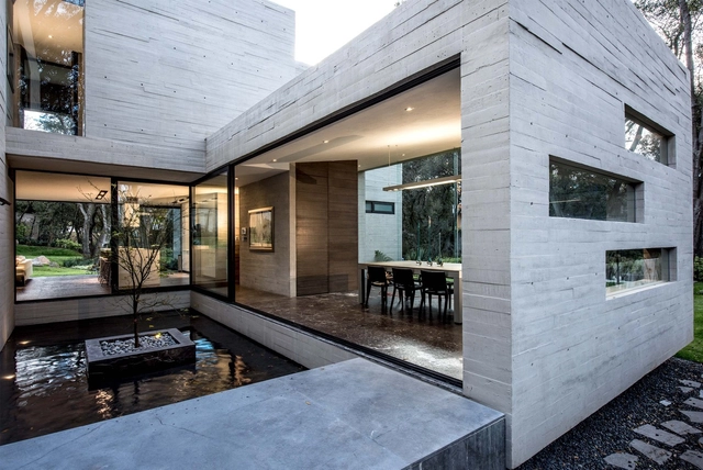 Casa Concreto / Grupo MM - Casas