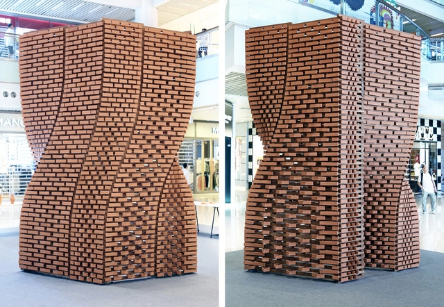 More Than 2,000 Unique Robotically Manufactured Bricks Generate Variable Walls in This Pavilion - Featured Image