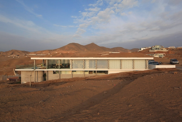 Casa Dominó / Metrópolis Oficina de Arquitectura   - Casas, Fachada