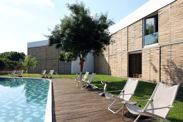 EcoSuites / Alex A. Tsolakis Architecture - Fotografía exterior, Hoteles, Sillas