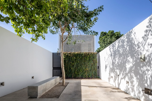 Taller 5.5 / P11 Arquitectos + Tao Arquitectura + Arq. Carlos Góngora - Arquitectura De Oficinas, Patio interior, Fachada